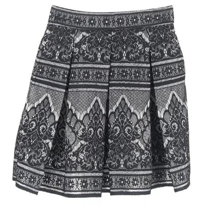 Maje Pleated Lace Detailed Mini Skirt In Black Polyamide