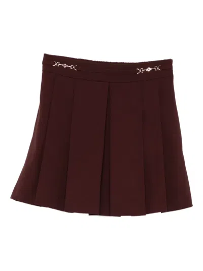 Maje Pleated Metal-detail Mini Skirt In Burgundy