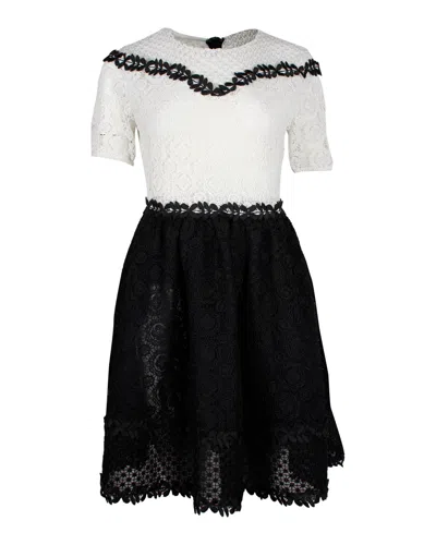 Maje Renald Floral Lace Skater Mini Dress In White Polyester In Black