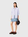 Maje Rhinestone Pleated Denim Skirt In Blue