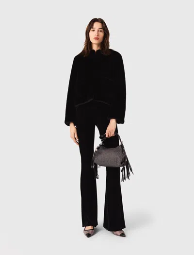 Maje Stretch Velour Trousers In Black