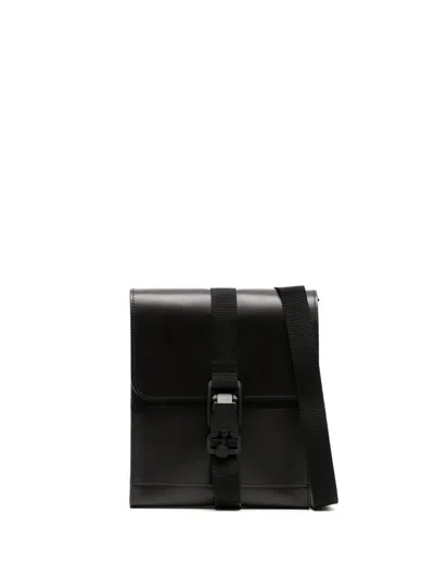 Makavelic Embossed-logo Leather Shoulder Bag In Black