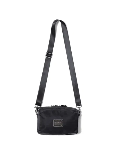 Makavelic Zipped Plaque Shoulder Bag In Black