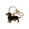 Make Heads Turn Women's Black / Gold Enamel Keychain / Bag Charm Dachshund In Multi