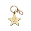 Make Heads Turn Women's Yellow / Gold Enamel Keychain / Bag Charm Golden Star In Gold