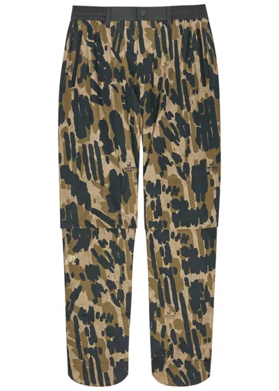 Malbon Tour Divot Camouflage-print Nylon Trousers In Neutral