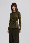 Malina Mailey  Jersey Brooch Long Sleeve Top In Green