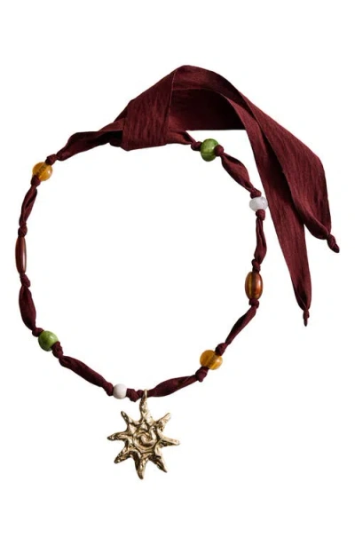 Mango Beaded Sun Pendant Necklace In Burgundy
