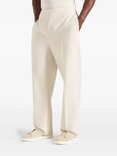 Manière De Voir Henri Pleat-detailed Trousers In Neutral