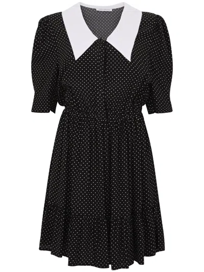 MAR DE MARGARITAS MAR DE MARGARITAS BLACK SHORT DRESS WITH WHITE POLKA DOTS