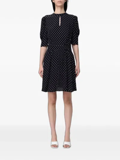 Mar De Margaritas Kimberly Polka-dot Mini Dress In Black