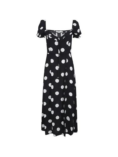 Mar De Margaritas Nikita Polka-dot Smocked Dress In Black
