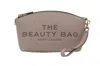 Marc Jacobs The Beauty Bag Grey Clutch Bag With Logo Print On The Front In Leather Woman In Brown