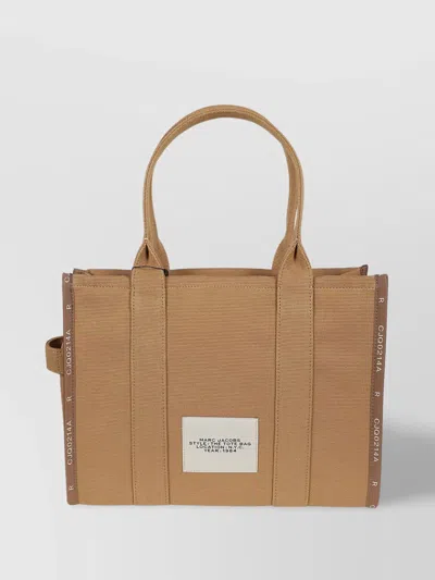 Marc Jacobs Canvas Travel Tote Featuring Printed Profiles In Brown
