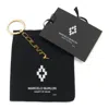 Marcelo Burlon County Of Milan Gold County Keychain In Gold