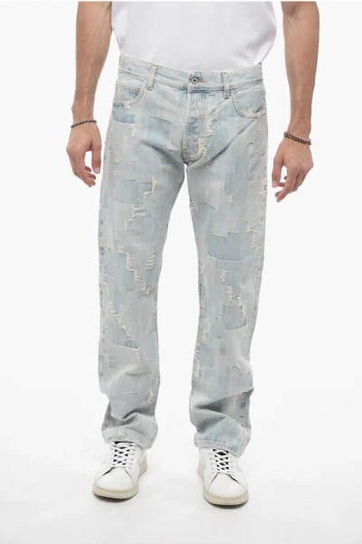 MARCELO BURLON COUNTY OF MILAN LIGHT-WASHED DISTRESSED DENIMS WITH PATCHWORK DESIGN