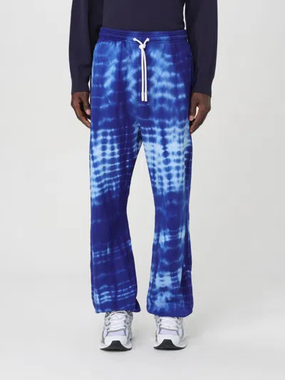 MARCELO BURLON COUNTY OF MILAN PANTS MARCELO BURLON COUNTY OF MILAN MEN COLOR BLUE,F18194009
