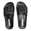 MARIA ARISTIDOU WOMEN'S PLAY BLACK WHITE SLIDES