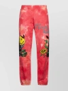 MARKET WAISTBAND TROUSERS WITH CUFFED HEM AND PRINTED DESIGN