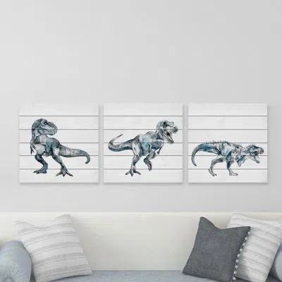 Marmont Hill Bite And Fight T-rex 3-piece Print On White Wood Set In Blue,white,black,gray