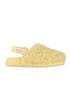 Marni Shearling And Leather Mules In Yellow