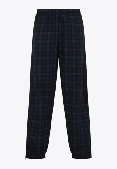 MARTINE ROSE CHECKED TRACK PANTS