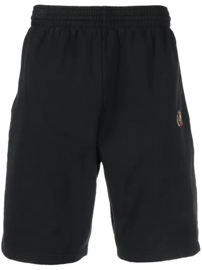MARTINE ROSE LOGO-PRINT TRACK SHORTS