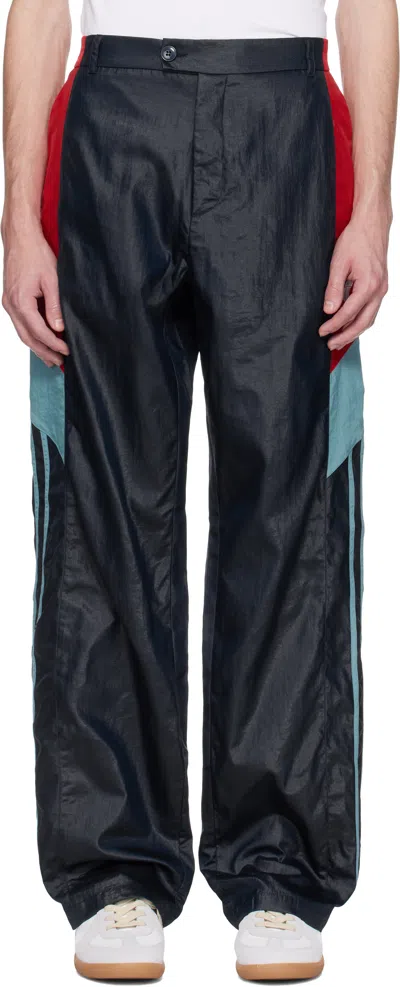 MARTINE ROSE NAVY PANELED TRACK PANTS
