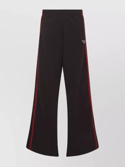 MARTINE ROSE RELAXED FIT WIDE LEG SPORTS TROUSERS