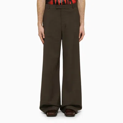 MARTINE ROSE TROUSERS WITH BROWN HOUNDSTOOTH PATTERN