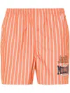 Martine Rose X Tommy Jeans Logo-print Striped Shorts In Orange