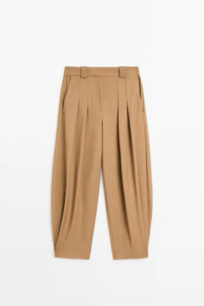 Massimo Dutti Pantalón De Lana Con Pliegues Y Detalle De Botón In Camel