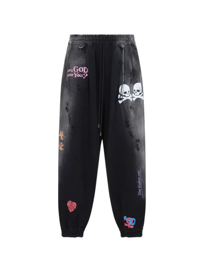 Mastermind Japan Distressed Graphic-print Track Pants In Black