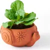 Matr Boomie Rakshana Plant Pot In Multi