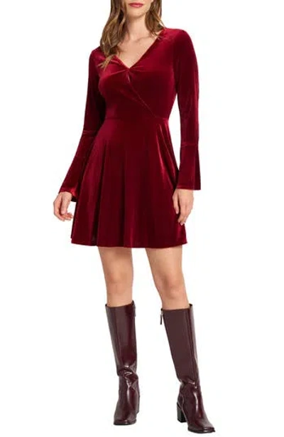 Matty M . Surplice Neck Bell Sleeve Velvet Dress In Red