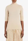 Max Mara Cecina Virgin Wool Turtleneck Sweater In Cream