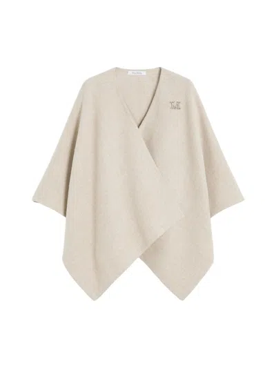 MAX MARA SHORT CAPE WITH A RECTANGULAR DESIGN, CAN BE WORN CLOSED WITH A BROOCH OR OPEN WITH A MAXI LAPEL.
