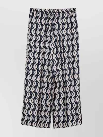 MAX MARA SILK TROUSERS WITH ALL-OVER PRINT AND WIDE LEG