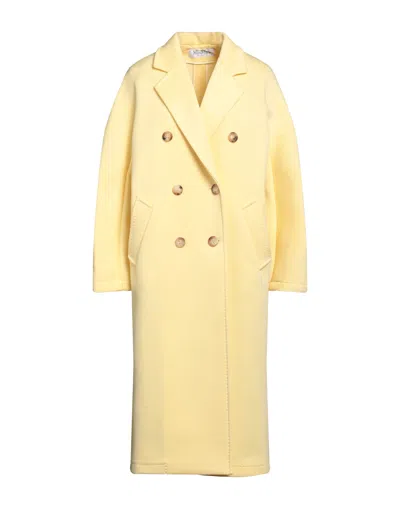 Max Mara Coats In Yellow