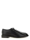 Max Mara Leather Derby. In Black