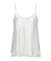 Maxco. Tops In White