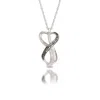 Maxcolor Sterling Silver 0.2 Carat White & Black Diamond Infinity Heart Necklace With Adjustable 18"-20" Rope In Black