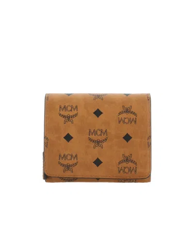 Mcm All-over Logo Printed Wallet In Brown