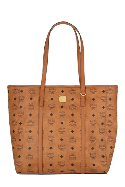 Mcm Allover Logo Printed Tote Bag In Brown