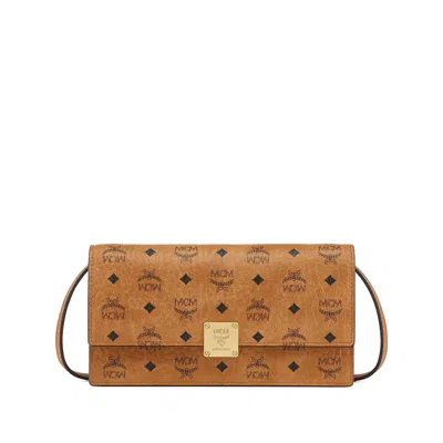 Mcm Clutch Bags In Brown