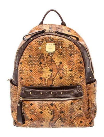 Pre-owned Mcm Embossed Leather Backpack In Brown
