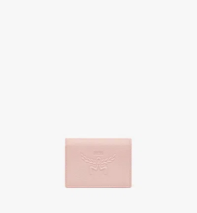 Mcm Embossed Logo Leather Wallet In Pink