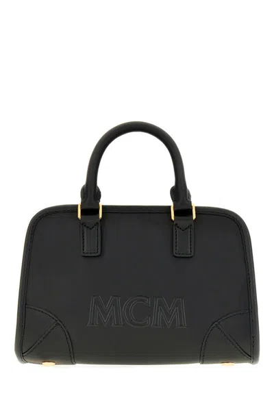 Mcm Handbags. In Black
