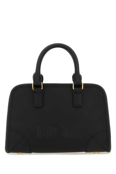 Mcm Handbags. In Black