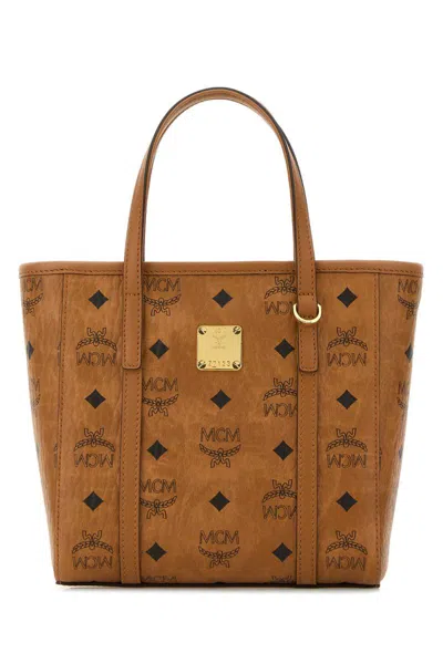 Mcm Handbags. In Brown